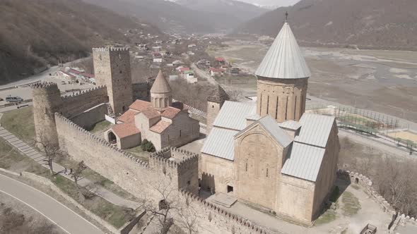 Aerial view of old Ananuri Fortress with two churches and picturesque view on river. Georgia 2021