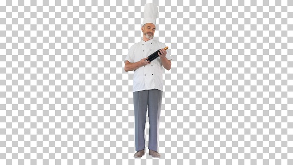 Smiling male chef cook holding a bottle, Alpha Channel