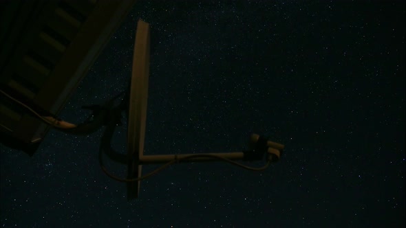 Satellite Antenna On The Background Of The Night Starry Sky Timelapse