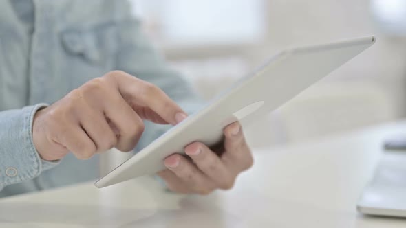 Close Up of Man Using Tablet