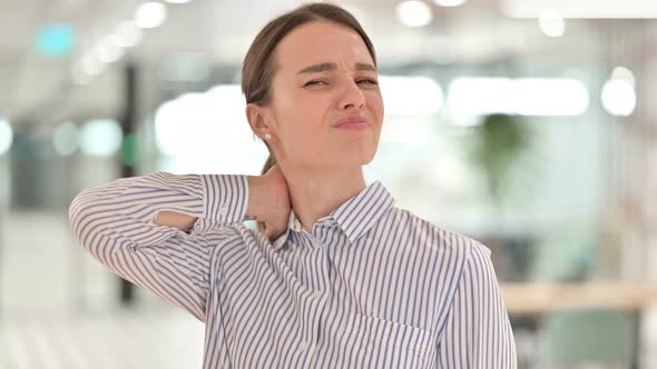 Portrait of Tired Young Woman Having Neck Pain