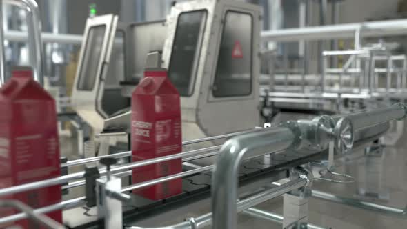Cherry Juice Cartons Advance On Automated Factory Production Conveyor Belts alt