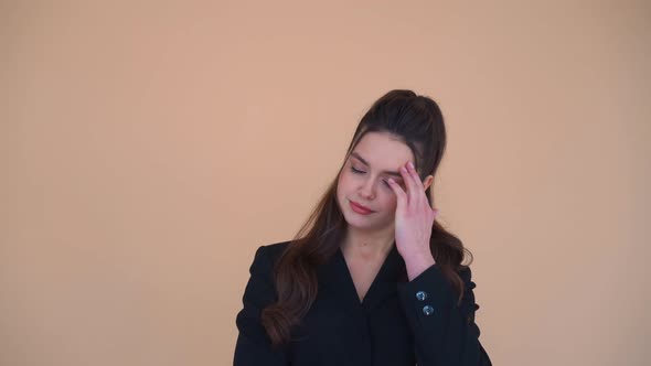 Woman with Pain in Her Temples American Woman in Black Jacket Suffering From Stress or Headache