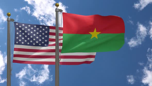 Usa Flag Vs Burkina Faso Flag On Flagpole