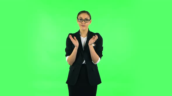 Girl Claps Her Hands with Dissatisfaction. Green Screen