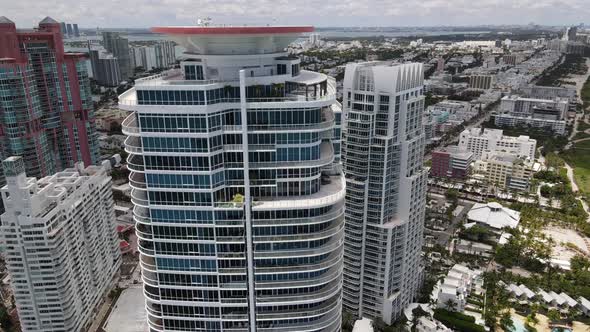 Aerial video tops of highrise buildings in Miami Beach FL
