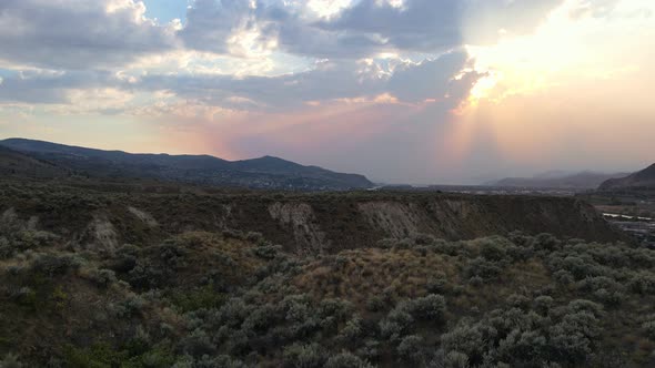 Stunning cloudscape with big thunderstorm clouds during sunset over the dry valleys of the Okanagan,