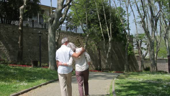Senior couple walking in the park, Istanbul, Turkey