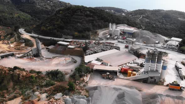 Cement concrete plant in mountains. Production of cement in industrial area