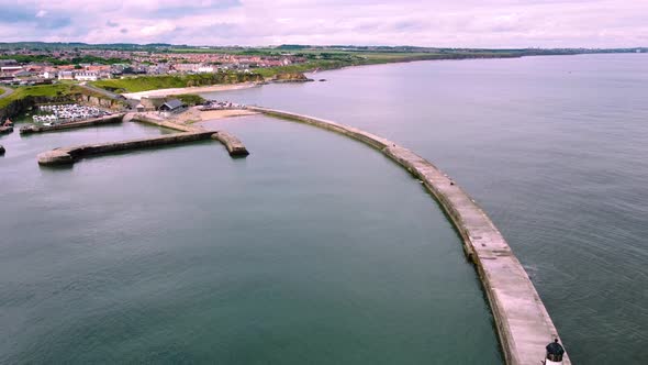 Drone Shot Accelerating Over Seaham Its Harbour and Lighthouse