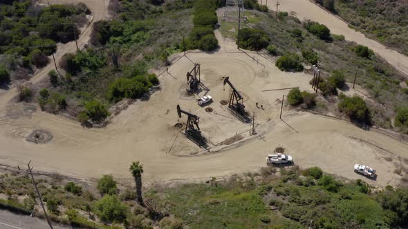 Oil pump jack on the factory. Aerial view oil refinery factory.