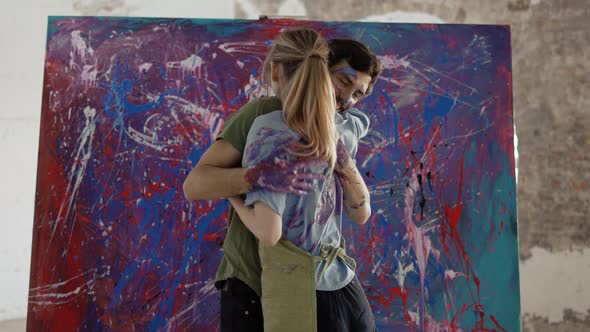 Couple in Love Hugging Standing in Front Large Canvas All in Paints