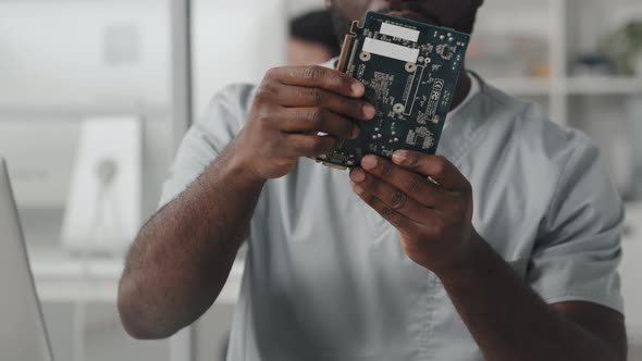 Engineer Examining Computer Graphic Card