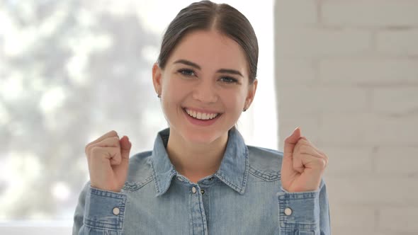 Young Girl Celebrating Success