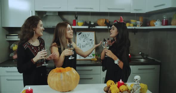 Dacing Girls at Halloween Party, Drinking Wine