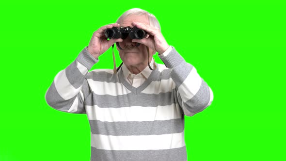 Senior Man Using Binoculars