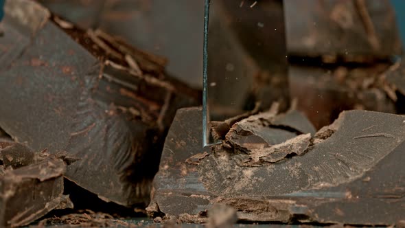 Super Slow Motion Shot of Cutting Raw Chocolate Chunk at 1000 Fps