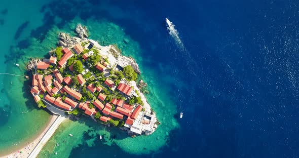 Aerial drone view of town village of semi island Sveti Stefan in Montenegro