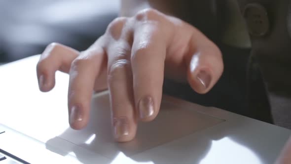 Hands of Woman Using Touchpad