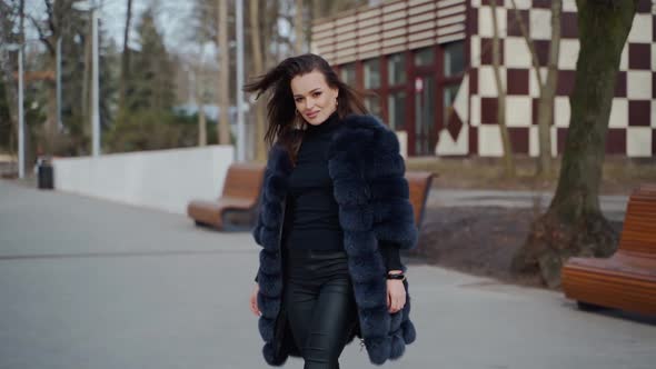 Attractive girl posing in the park