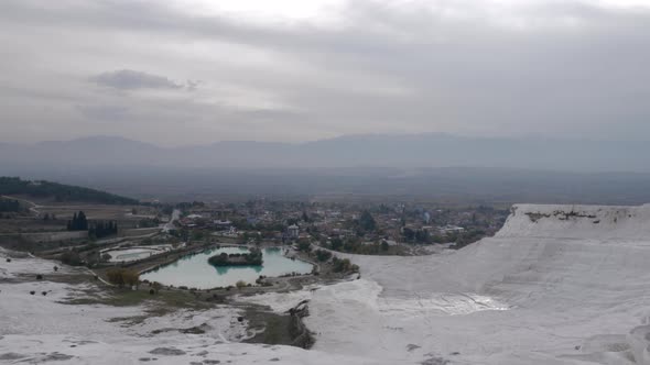 Travertine terraces overlooking the town panorama Pamukkale, Turkey