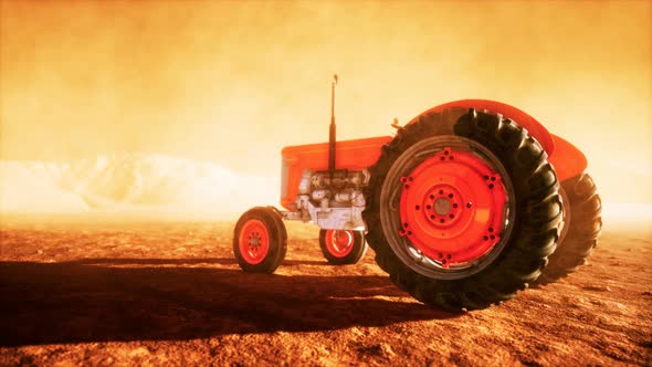 Vintage Retro Tractor on a Farm in Desert