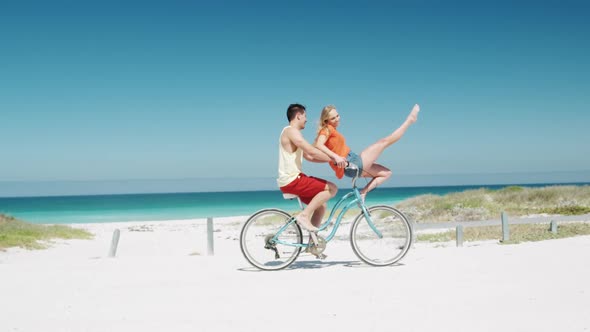 Couple in love enjoying free time on the beach together