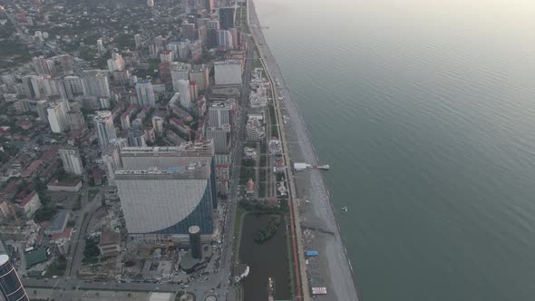 Aerial shot of Dinamo Batumi Stadium near Heroes Square against cityscape