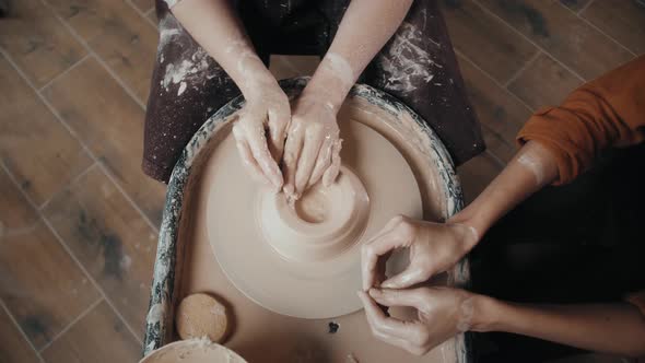 Close Up of Potter Clay Wheel Pottery Workshop Woman Making Diy Pot to Sale in Ecommerce Store Home