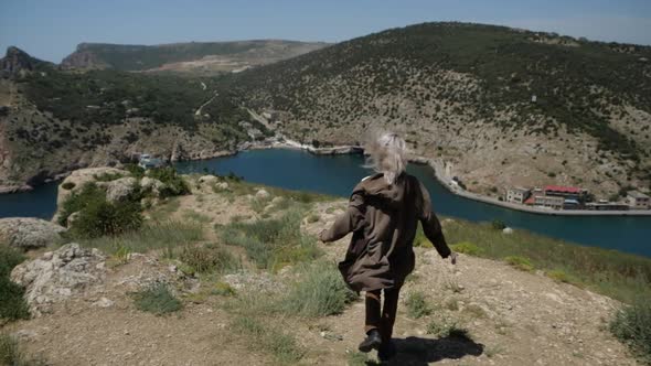 A Young Man Escapes From a Mountain To Meet a Beautiful Landscape