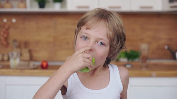 Funny Child Eating Apple