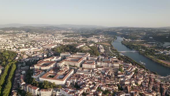 Coimbra cityscape and Mondego River. University historical buildings. Aerial view