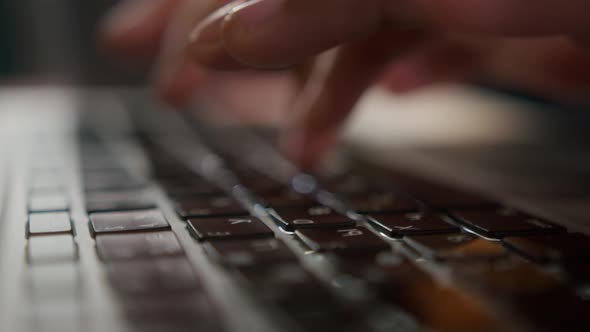 Close Up of Black African Business Man Hands Working Using Keyboard of Computer Laptop Teenager or