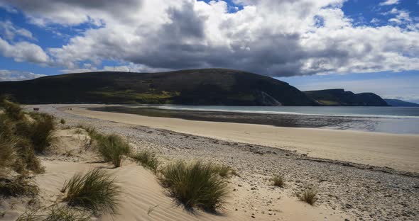 Time Lapse of summer sunny day sand beach on Wild Atlantic Way in Ireland.