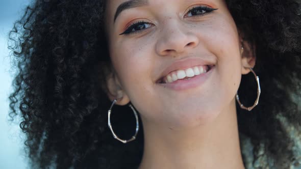 Beautiful Confident Young African Girl Laughs. Happy Ethnic Student with Brown Eyes, Curly Afro