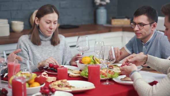 Friends at the Party Have Fun and Eat Pizza