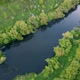 View of the river from above. Flight over water and forest trees from a height - VideoHive Item for Sale