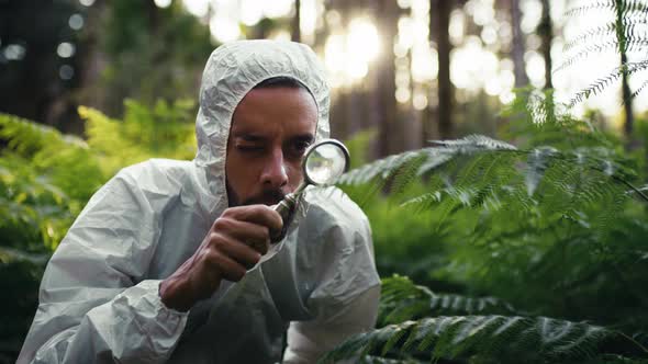 Microbiologist Checks the Plants in the Mountains