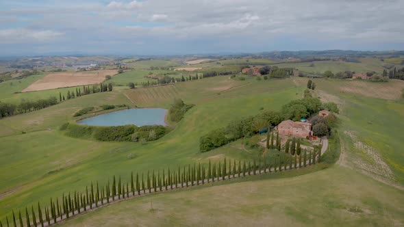 Aerial Shot. Beautiful Italian Tuscany. View of Small Towns or Villas.