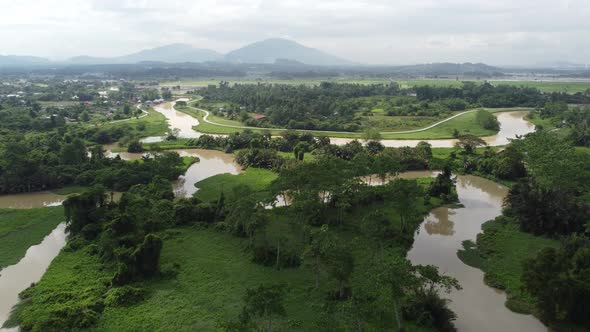 Aerial fly forward Sungai Perai river