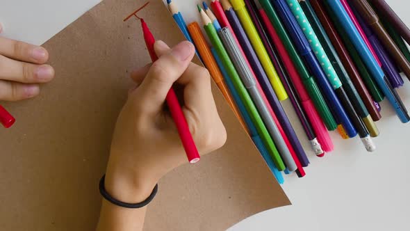 Children's Hand Writes a Letter to Santa Claus