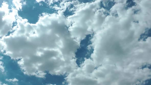 Cumulus Rain Clouds In Blue Sky