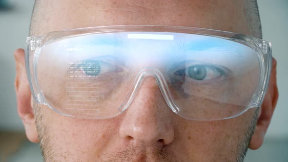 Close Up of Man in Smart Glasses with Coding 85