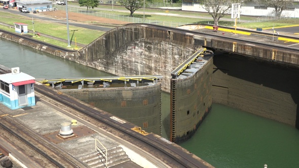 A cargo ship passes through the gates of the Panama Canal.