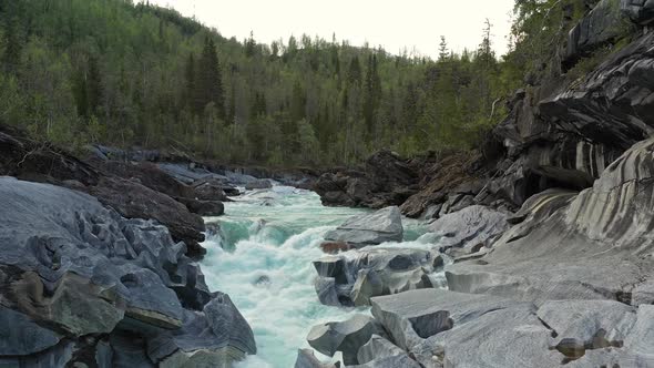 Drone move above  mountain river Glomaga, Marmorslottet, Mo i Rana,Norway