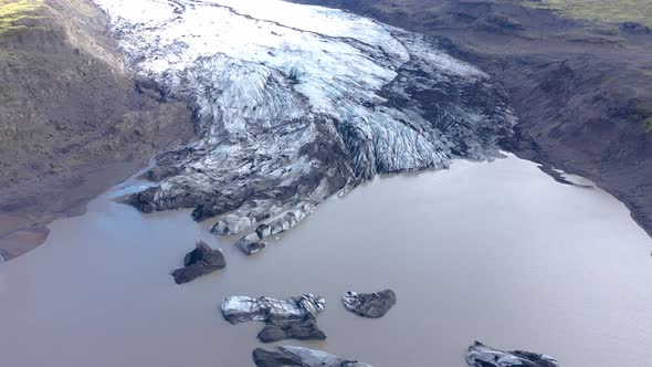 Aerial View of Floating Icebergs in Fjallsarlon Glacier, Iceland. Climate Change, Global War Concept