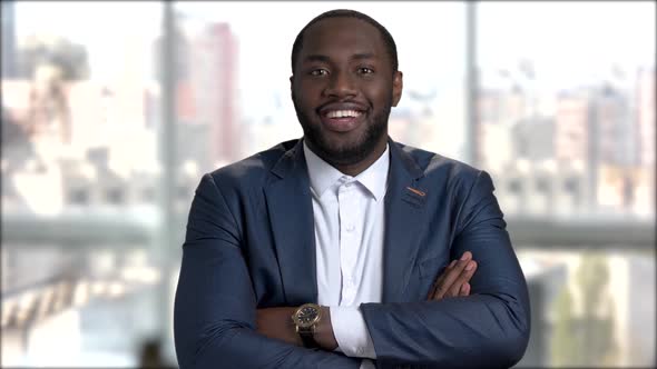 Stylish Afro-american Businessman with Arms Crossed.