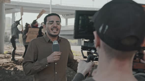 Man Doing Live Coverage of Protest