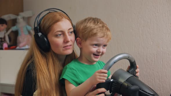 Cute Family Playing On The Computer