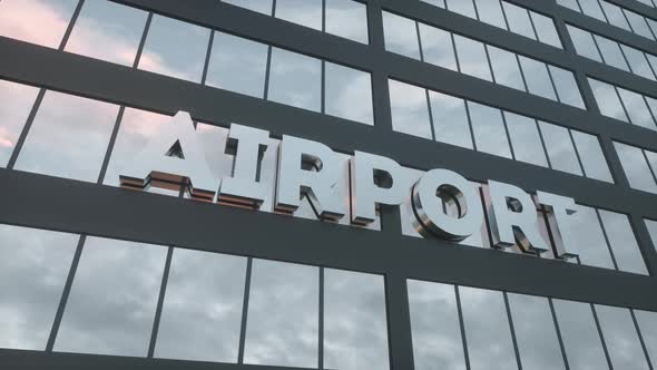 Airport Sign on a Modern Glass Skyscraper